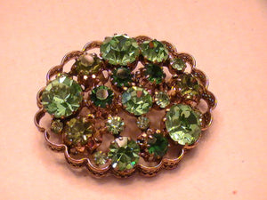 The Queen's Coveted Pin of Wealth